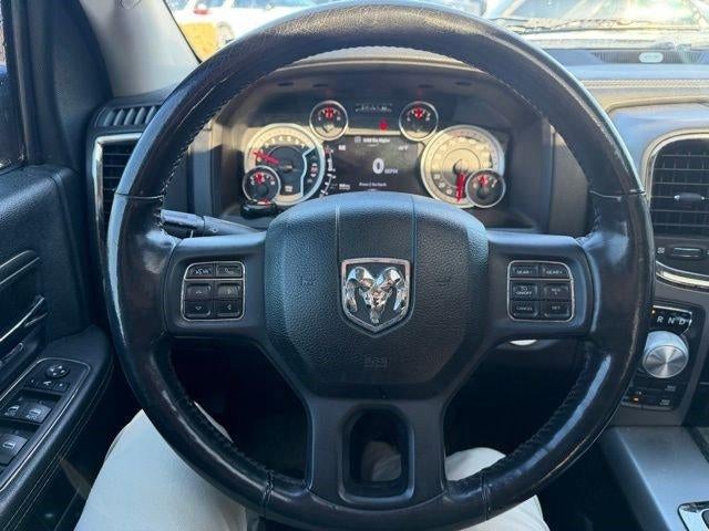 2014 RAM 1500 4WD Quad Cab 6.4 Ft Box Sport