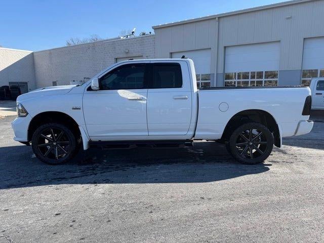 2014 RAM 1500 4WD Quad Cab 6.4 Ft Box Sport