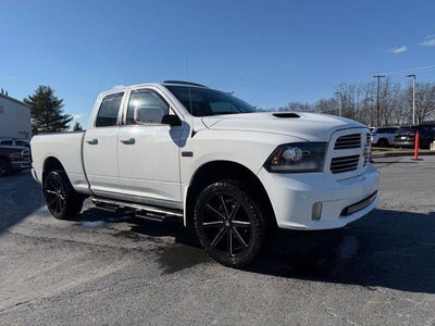 2014 RAM 1500 4WD Quad Cab 6.4 Ft Box Sport